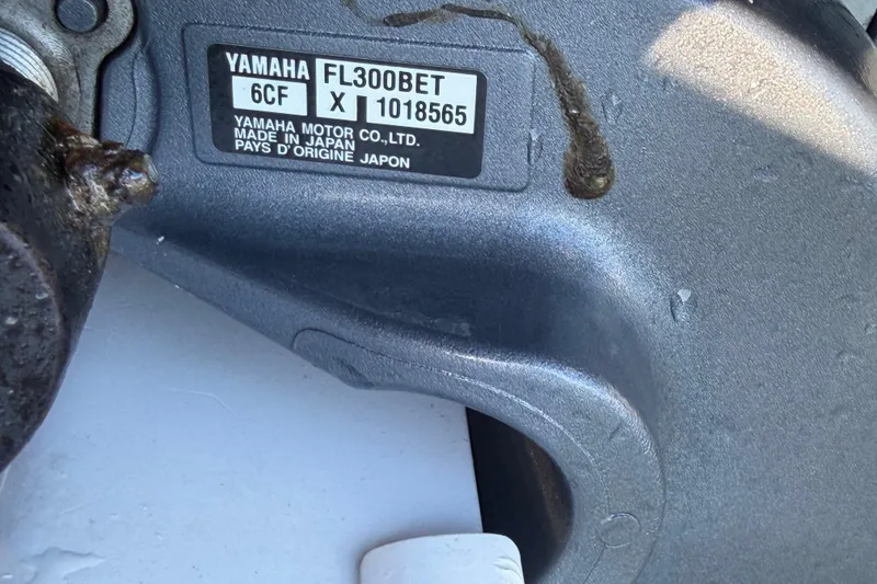 Slide: The Image of Yamaha FL300BET engine label on 1999 Donzi 35 ZF Cuddy boat. - 34