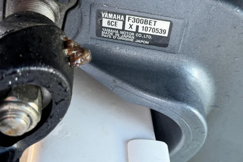 Slide: The Image of Close-up of Yamaha F300BET engine part on 1999 Donzi 35 ZF Cuddy boat. - 35