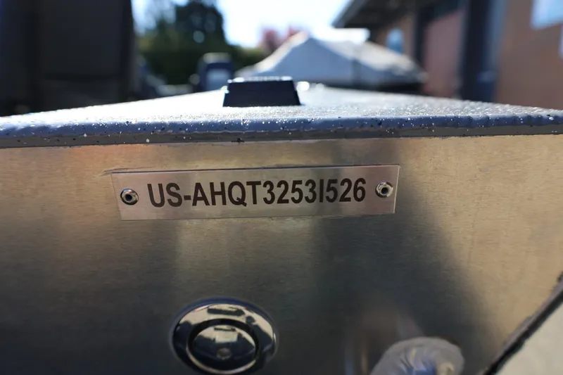Slide: The Image of 2026 Thunder Jet 229 Rush OT boat with visible identification plate, US-AHQT32531526. - 27