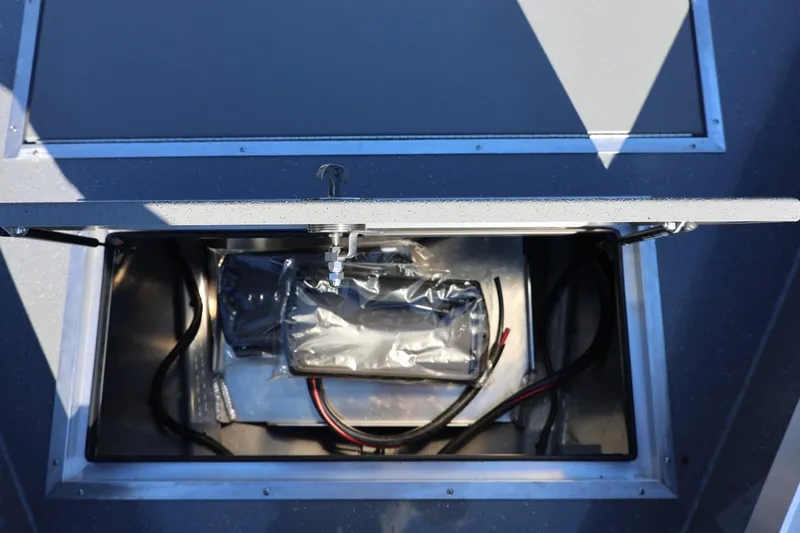 Slide: The Image of Open storage compartment in 2026 Thunder Jet 229 Rush OT boat. - 40