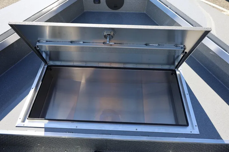 Slide: The Image of Open storage compartment in 2026 Thunder Jet 229 Rush OT boat. - 41