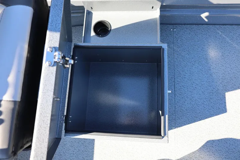 Slide: The Image of Open storage compartment in 2026 Thunder Jet 229 Rush OT boat interior. - 43