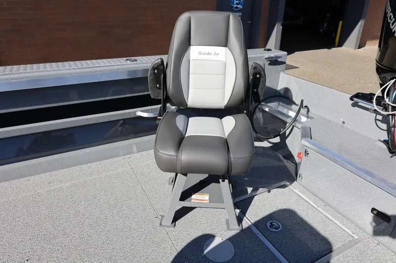 Slide: The Image of 2026 Thunder Jet 229 Rush OT boat seat, gray and white, on deck. - 50