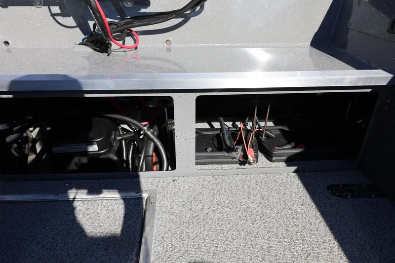 Slide: The Image of Interior view of 2026 Thunder Jet 229 Rush OT boat wiring and compartments. - 55