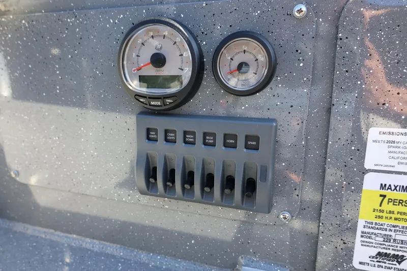 Slide: The Image of Dashboard of 2026 Thunder Jet 229 Rush OT with gauges and switches. - 57