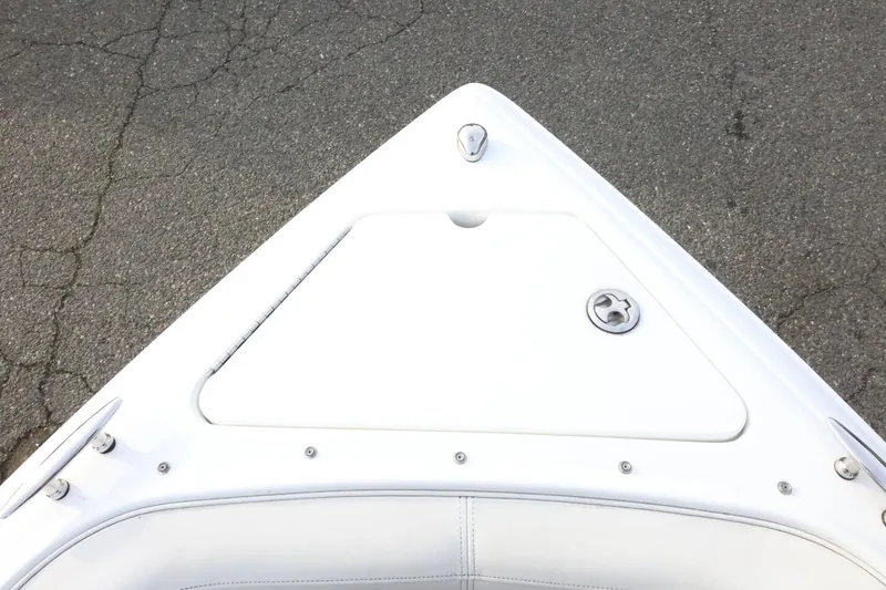 Slide: The Image of Bow of a 2005 Cobalt 200 boat on asphalt surface. - 20