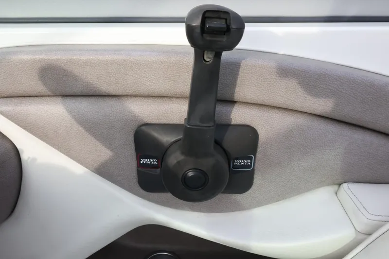 Slide: The Image of 2005 Cobalt 200 boat throttle control with Volvo Penta branding. - 29