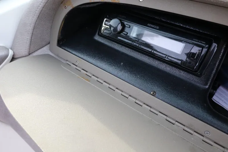 Slide: The Image of Kenwood stereo system in 2005 Cobalt 200 boat dashboard compartment. - 36