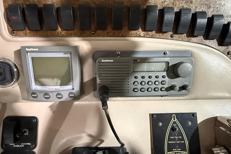 Slide: The Image of Control panel of a 2000 Sea Ray Sundancer 310 with Raytheon electronics. - 32