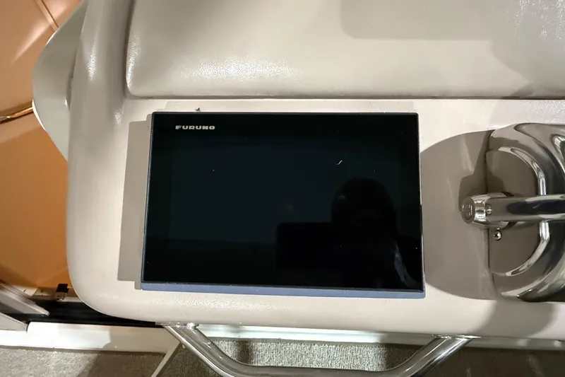 Slide: The Image of Furuno marine display on 2000 Sea Ray Sundancer 310 dashboard. - 33