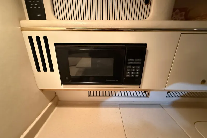 Slide: The Image of Built-in microwave in 2000 Sea Ray Sundancer 310 yacht kitchen area. - 45