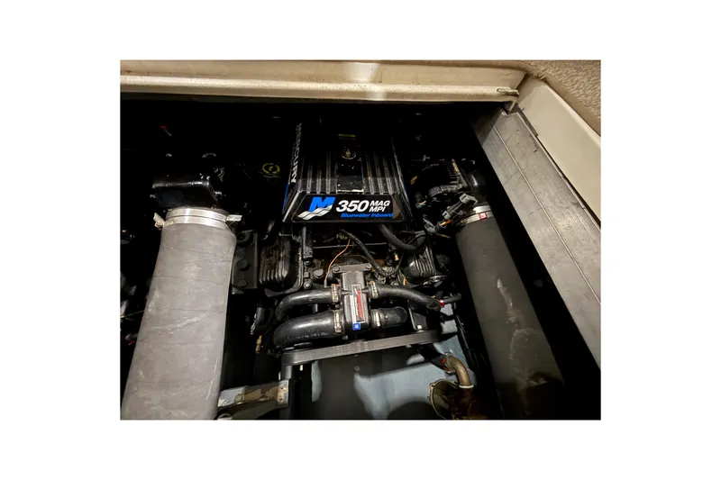 Slide: The Image of Engine compartment of a 2000 Sea Ray Sundancer 310 with MerCruiser 350 MAG MPI engine. - 59