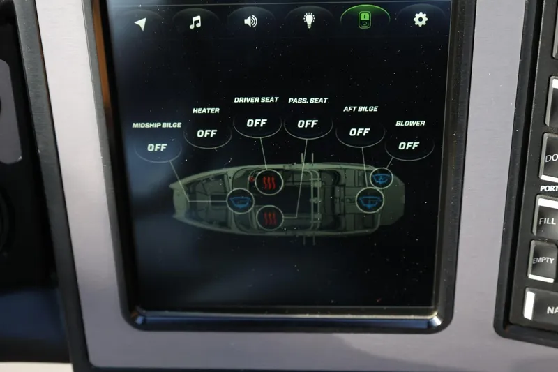 Slide: The Image of 2020 MasterCraft XStar touchscreen control panel displaying various boat settings. - 35