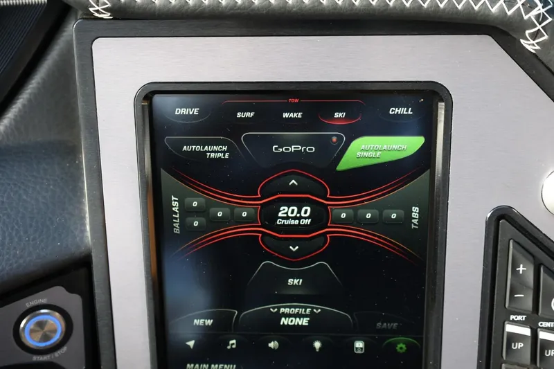 Slide: The Image of 2020 MasterCraft XStar touchscreen display showing control settings for drive, surf, wake, and ski modes. - 36