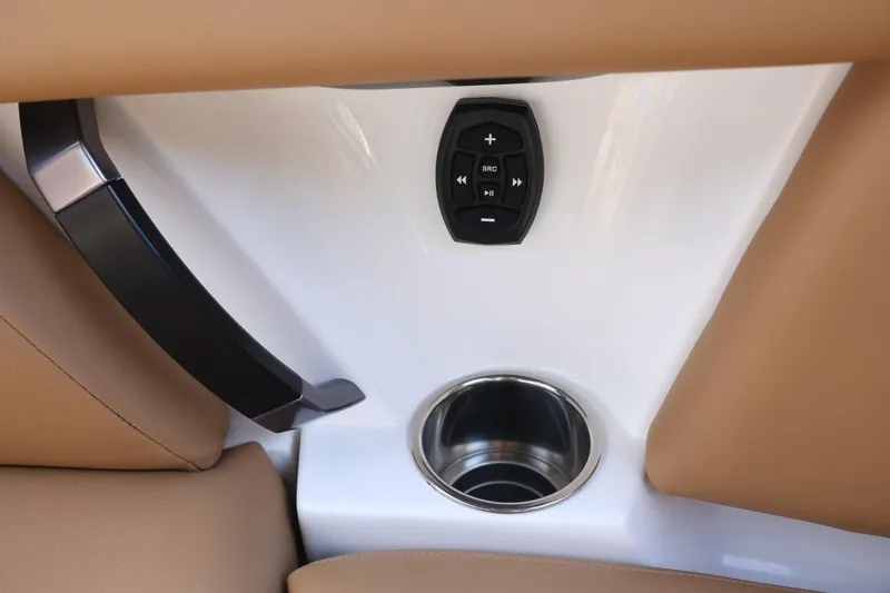 Slide: The Image of Interior of 2020 MasterCraft XStar with control panel and cup holder. - 44