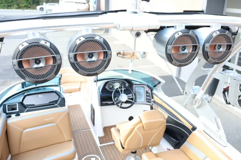 Slide: The Image of 2020 MasterCraft XStar boat interior with premium audio system and luxurious seating. - 50