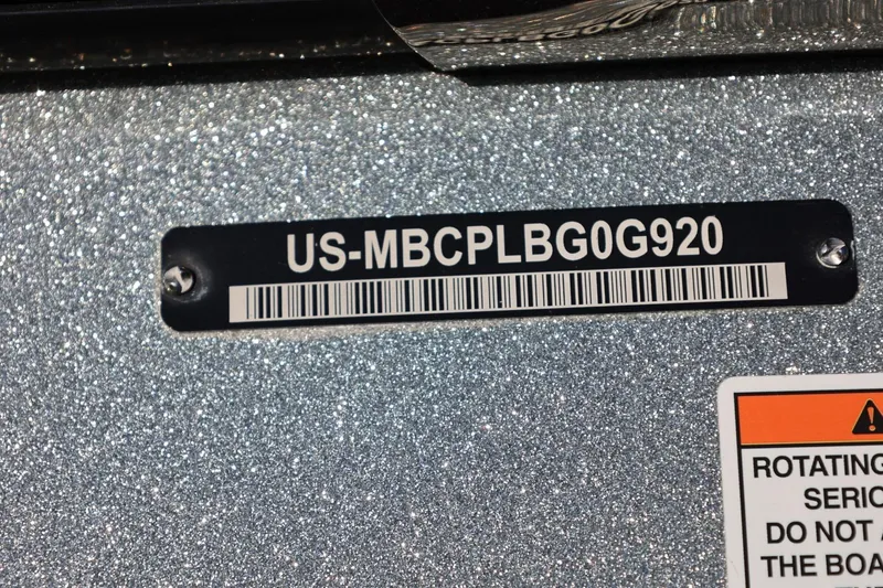 Slide: The Image of 2020 MasterCraft XStar boat identification plate with serial number and warning label. - 59