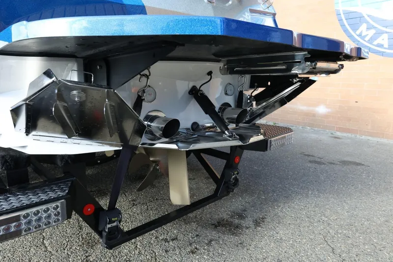 Slide: The Image of Rear view of 2020 MasterCraft XStar boat showing propeller and exhaust system. - 8