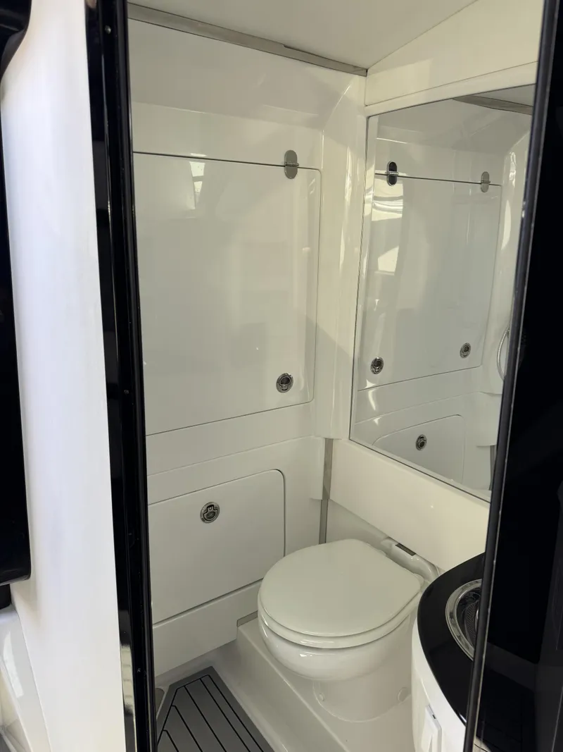 Slide: The Image of Nor-Tech 450 Sport Center Console 2025 - 30