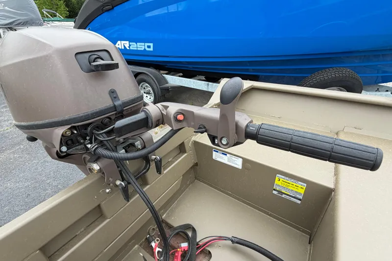 Slide: The Image of Outboard motor on 2026 G3 Gator Tough Package Jon 15 FL boat. - 4