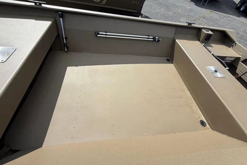 Slide: The Image of Interior view of 2026 G3 Gator Tough Package Jon 15 FL boat, showcasing spacious deck. - 6