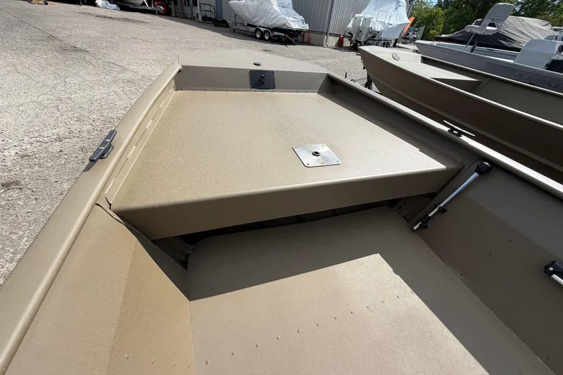 Slide: The Image of 2026 G3 Gator Tough Package Jon 15 FL boat interior, featuring durable seating and storage. - 8