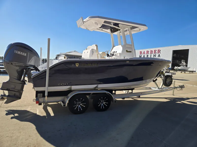 Slide: The Image of 2024 Century 2400CC boat on trailer at Barber Marina. - 3