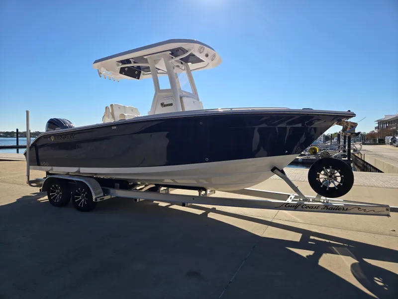 Slide: The Image of 2024 Century 2400CC boat on trailer at harbor. - 4