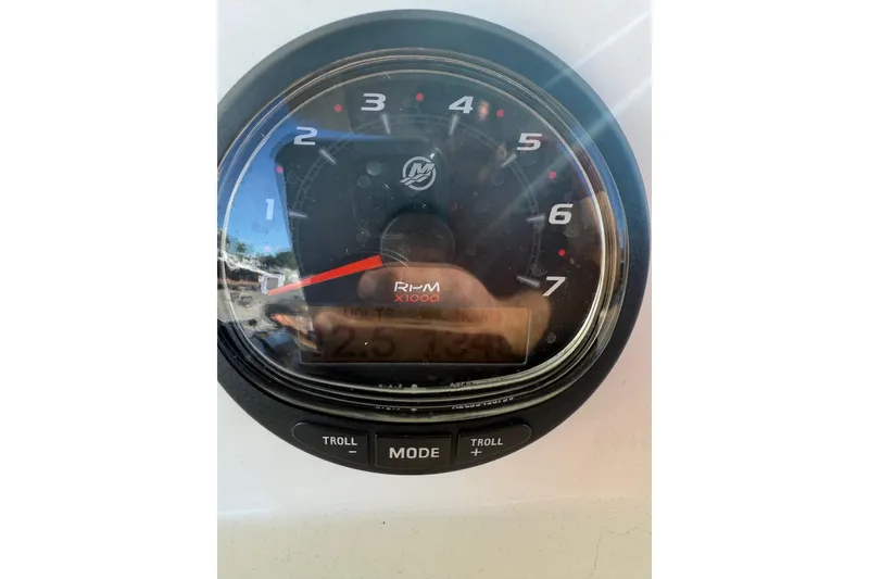 Slide: The Image of Close-up of a 2018 Scout 225 XSF boat tachometer displaying RPM. - 16