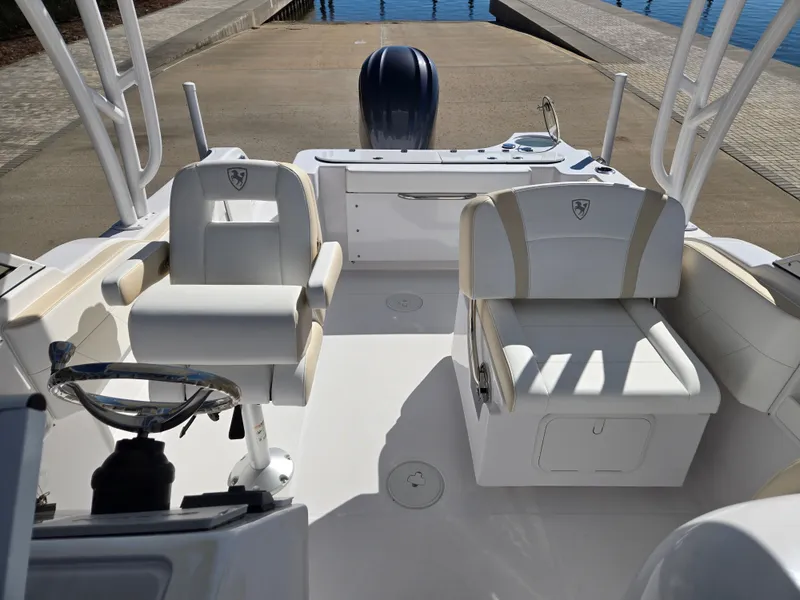 Slide: The Image of Interior of 2024 Century 24 DC boat with white seating. - 7