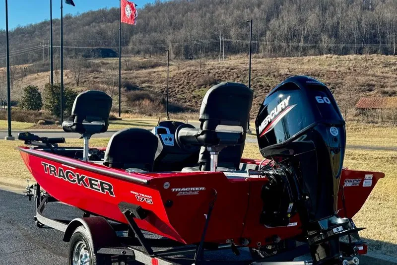 Slide: The Image of 2026 Tracker Pro Team 175 Crappie Edition boat with Mercury 60 engine, parked outdoors. - 6