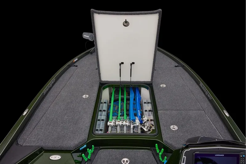 Slide: The Image of 2026 Ranger Z521 boat deck with carpeted surface and storage compartments. - 18
