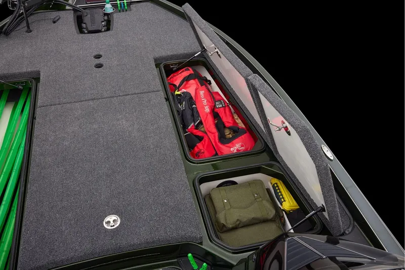 Slide: The Image of 2026 Ranger Z521 boat deck with carpeted surface and storage compartments. - 19