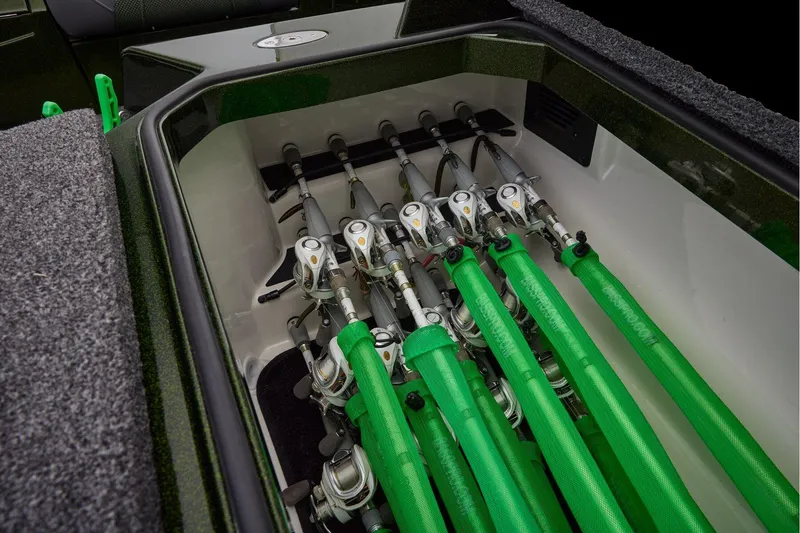 Slide: The Image of 2026 Ranger Z521 boat storage compartment with carpeted interior and sleek design. - 21