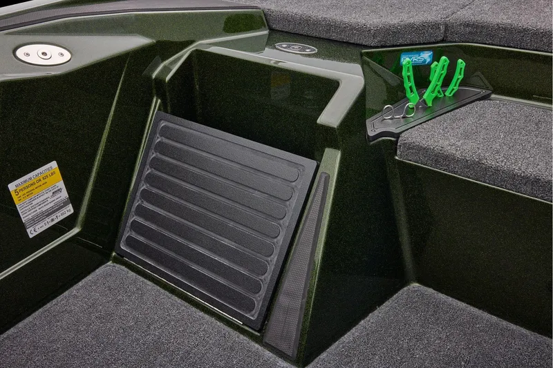 Slide: The Image of 2026 Ranger Z521 boat storage compartments with Ranger Boats logo. - 53