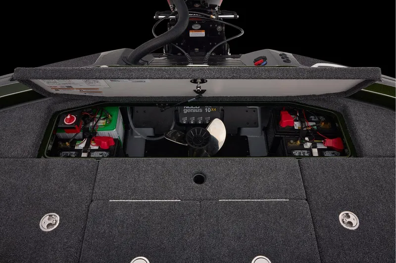 Slide: The Image of 2026 Ranger Z521 boat interior with open storage compartment and seating. - 58