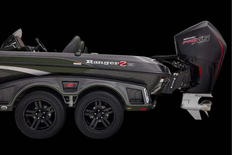 Slide: The Image of 2026 Ranger Z521 boat interior with gray carpeted deck and seating. - 60