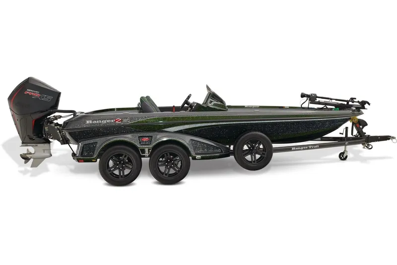 Slide: The Image of 2026 Ranger Z521 boat with Yamaha outboard motor, parked outdoors. - 7