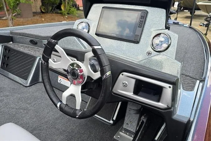 Slide: The Image of 2026 Nitro Z20 XL Pro boat dashboard with steering wheel and digital display. - 5
