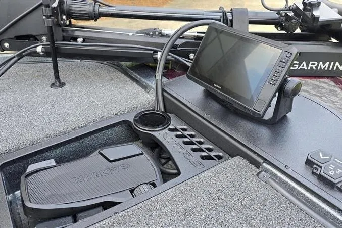 Slide: The Image of Nitro Z20 XL Pro 2026 boat dashboard with Garmin navigation system and foot pedal. - 10