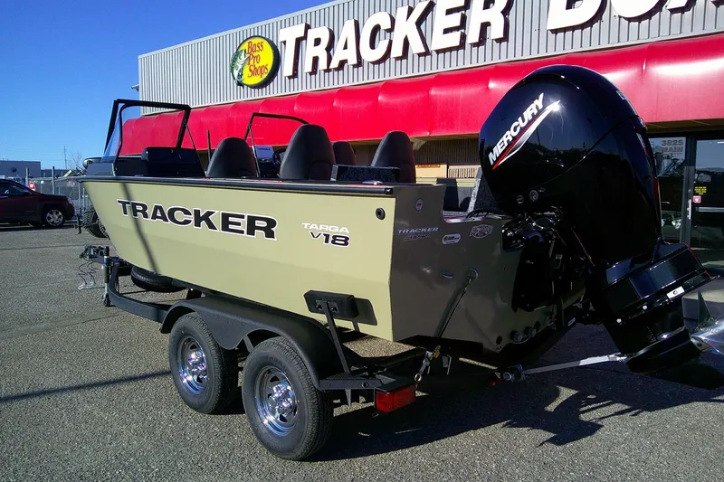 Slide: The Image of 2026 Tracker Targa V-18 Combo boat with Mercury engine at dealership. - 82
