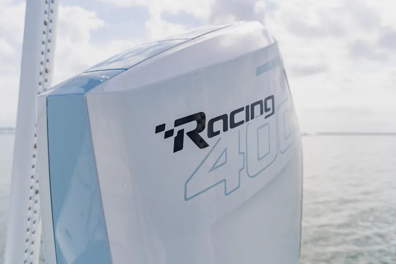 Slide: The Image of Close-up of a Broadwater 25 Bay Cat 2026 boat engine with "Racing 400" branding. - 43
