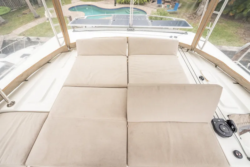 Slide: The Image of Luxurious sunbathing area on 2022 Lagoon 46 catamaran with pool view. - 145