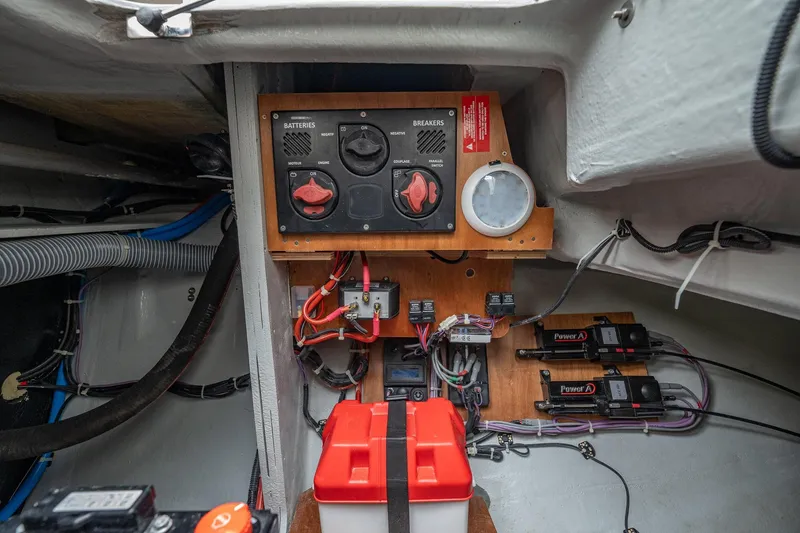 Slide: The Image of Electrical panel and wiring inside a 2022 Lagoon 46 catamaran. - 170