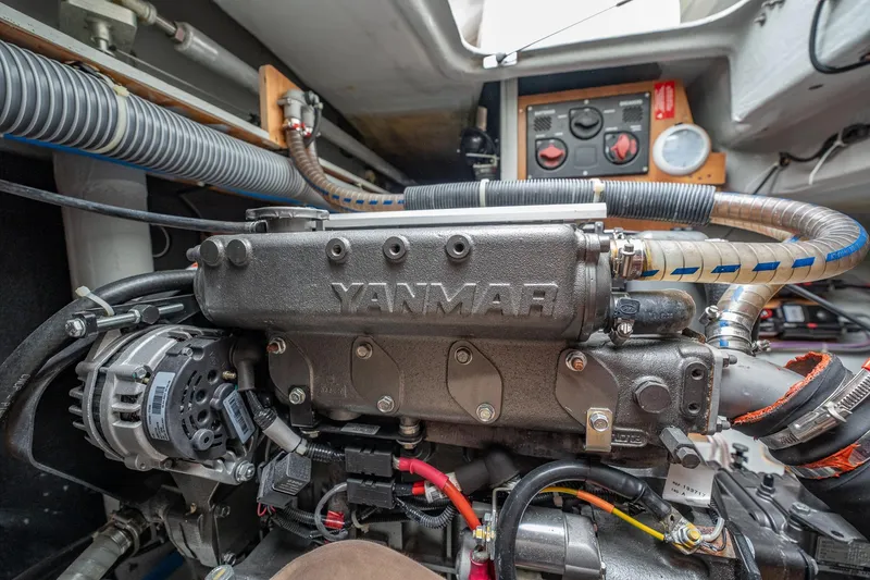 Slide: The Image of Engine compartment of a 2022 Lagoon 46 catamaran featuring a Yanmar engine. - 172