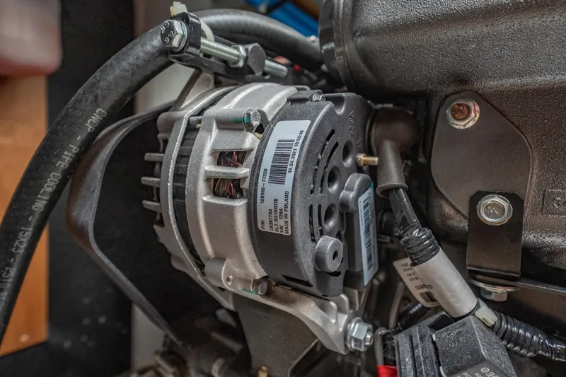 Slide: The Image of Close-up of a 2022 Lagoon 46 engine component with visible wiring and labels. - 177