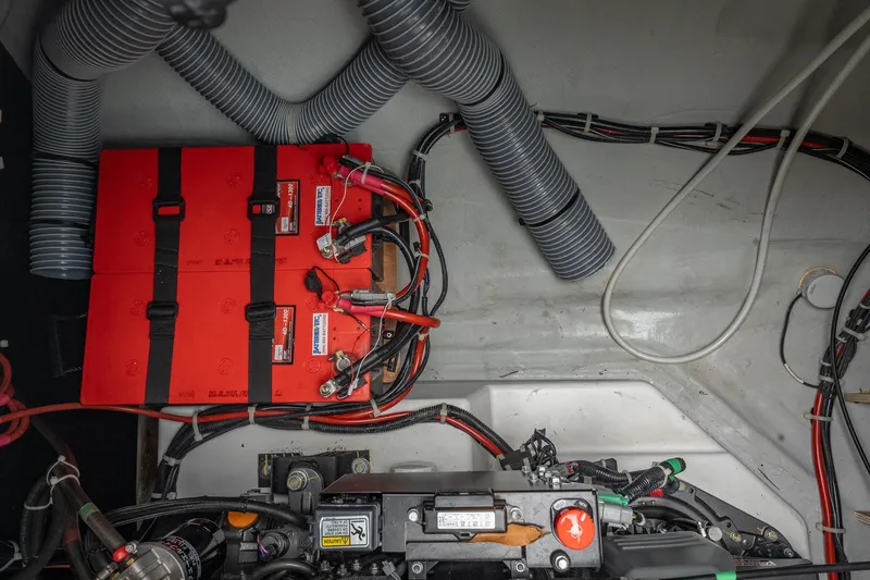 Slide: The Image of Electrical system of a 2022 Lagoon 46 yacht, featuring batteries and wiring. - 183