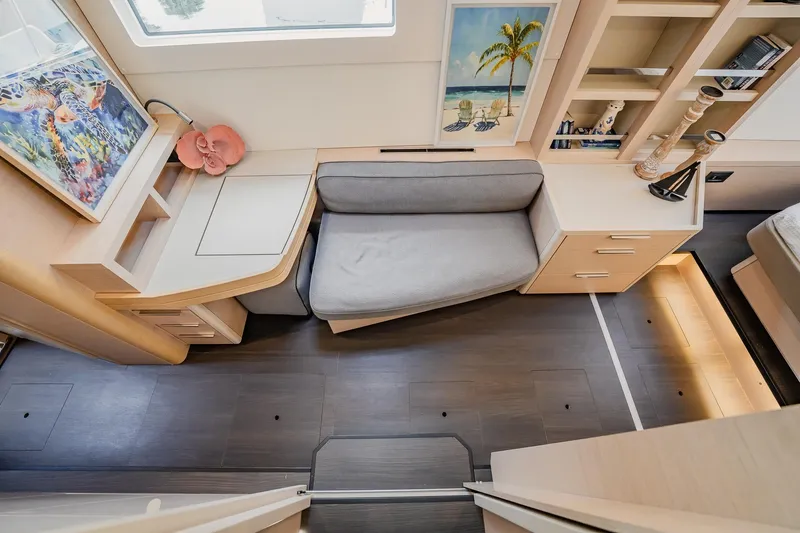 Slide: The Image of Luxurious interior of 2022 Lagoon 46 yacht with modern decor and cozy seating area. - 42