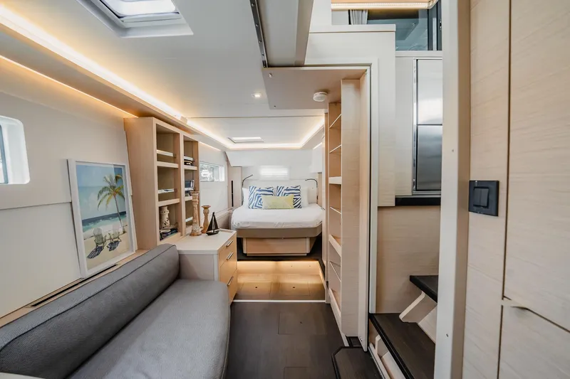 Slide: The Image of Luxurious interior of 2022 Lagoon 46 yacht with modern furnishings and cozy bedroom. - 47