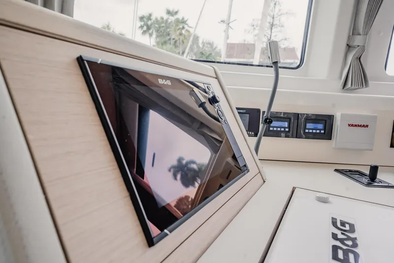 Slide: The Image of Control panel of 2022 Lagoon 46 catamaran with B&G navigation system. - 48